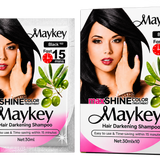 Maykey MaxSHINE Color Hair Darkening Shampoo Black 30ml shown side by side on a transparent background. The left package is a single-use sachet, and the right package is a ten-pack box.