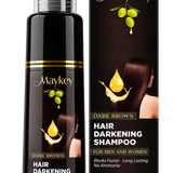 Maykey Dark Brown Hair Darkening Shampoo bottle next to its retail box, featuring a black design with gold lettering and olive branch graphics.